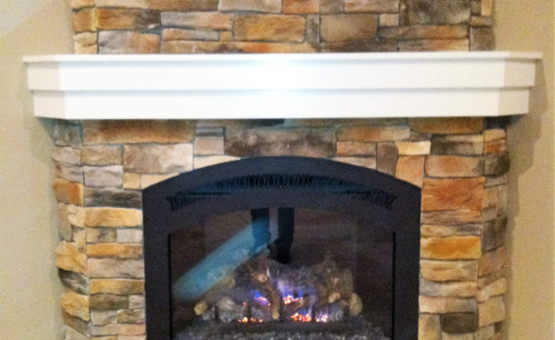 fireplace with stone surround