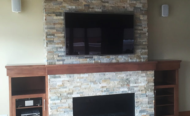 fireplace with stone surround