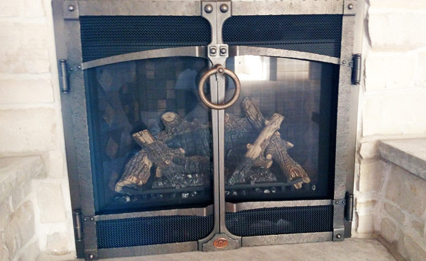 gas fireplace with custom doors