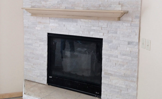 gas fireplace with thin brink surround