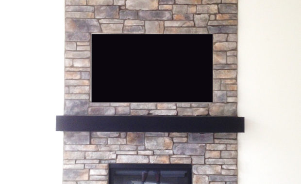 gas fireplace with stone surround